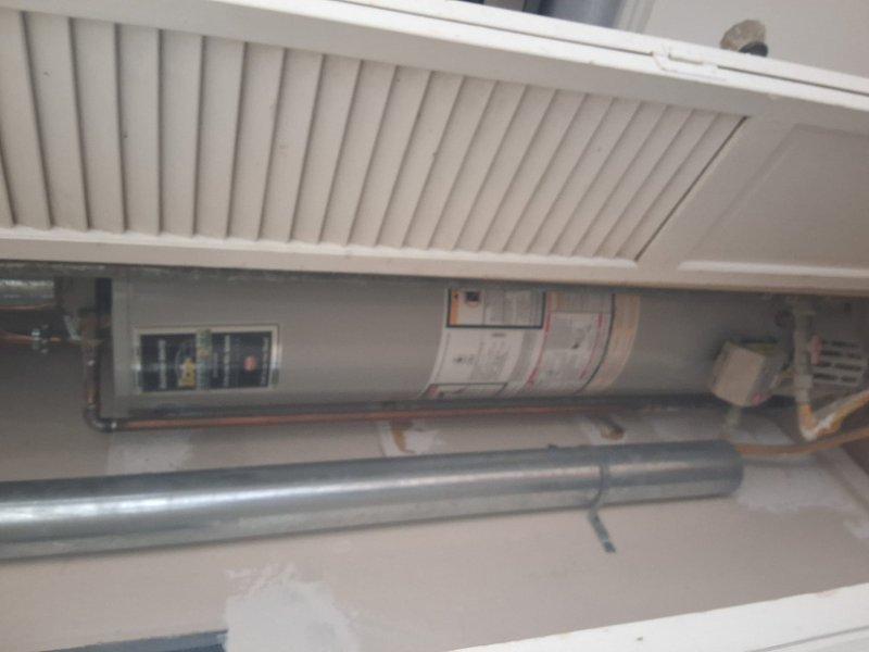 Completed full replacement of residential gas water heater on second floor with 30-gallon tall gas tank model U130T6VR. Existing unit required replacement with specific tall configuration due to spatial constraints in installation location. Removed old water heater, installed new 30-gallon gas unit, connected gas supply lines, water supply and discharge piping, and verified proper venting and operational functionality upon completion.
