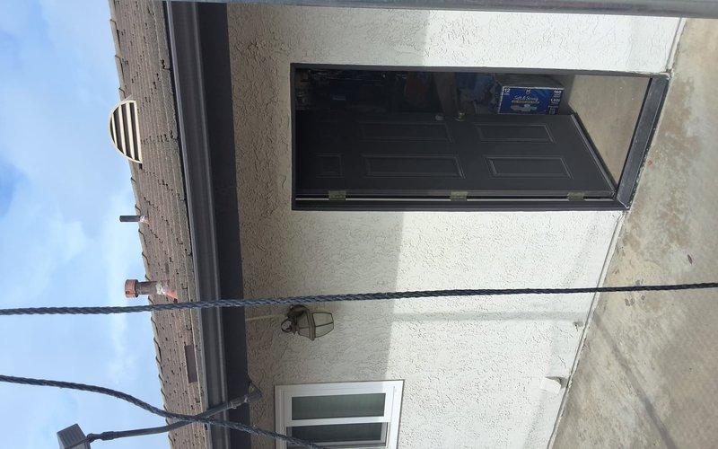 Completed conversion installation from 50-gallon atmospheric gas tank water heater (Model SG50T12AVG00, Serial GELN0404V00313) to tankless system. Installed Navien NPE-210A2 tankless water heater unit in garage/patio location per approved estimate and signed permit documentation. Removed existing tank-style water heater and reconfigured gas line, water supply lines, and venting system to accommodate tankless unit specifications. Installed required pressure relief valve, isolation valves, and proper condensate drainage. Secured all plumbing connections with appropriate fittings and verified gas line integrity. Tested unit operation, adjusted temperature settings, and confirmed proper ignition sequence and water flow. Completed full-day installation with all safety protocols observed and system fully operational upon departure.
