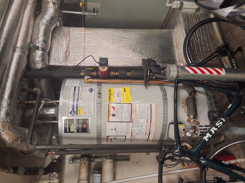 Responded to service call for hot water circulation pump model URG250L6N producing noise when timer was active. Upon inspection, diagnosed issue with timer control unit on Grundfos recirculation pump. Noise ceased when timer was switched to off position, confirming timer mechanism as source of malfunction. Evaluated pump assembly mounted on horizontal piping with brass compression fittings and verified all plumbing connections were secure. Documented existing installation including control unit with blue dial featuring OFF, AUTO, and ON settings. Recommended timer replacement to resolve operational noise issue and restore proper automated circulation function.