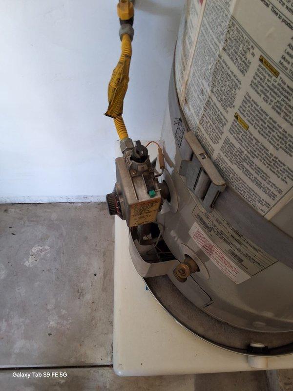 Performed inspection on leaking 40-gallon A.O. Smith gas water heater. Assessed condition of unit, gas valve assembly with flexible gas line connection, plumbing connections, and venting system. Documented existing installation including drip pan placement and confirmed leak condition requiring replacement. Provided estimate for new A.O. Smith model GN40T1-3-612YR 40-gallon gas water heater installation with 12-year warranty. Discussed permit requirements and scheduled installation appointment.