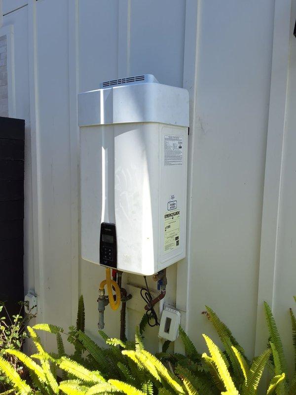 Completed warranty return visit to install replacement part for Navien NPE-210A tankless water heater (serial: 2082Y2230776619) that was experiencing no hot water condition with error code. Part had been previously ordered and unit was displaying fault code requiring component replacement. Successfully installed the ordered part, cleared error code from system, tested unit operation to verify proper heating function, and confirmed all connections secure. Unit now operating within normal parameters with no error codes present.