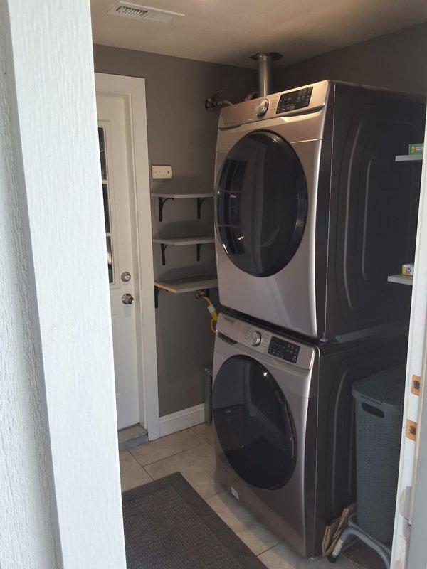 Performed inspection on existing 40-gallon gas water heater located in utility closet with reported gas leak. Assessed unit condition and confirmed need for replacement due to age and safety concerns. Discussed permit requirements with homeowner and provided estimate for new 40-gallon gas water heater installation, including proper venting and gas line connections per code requirements.