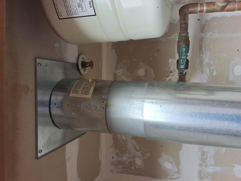 Responded to service call for 40-gallon gas direct vent water heater model PR540XODS (serial D06A095839) located in exterior closet with limited 27-inch depth clearance. Inspected existing unit and evaluated installation constraints due to shallow closet configuration. Discussed potential tankless water heater conversion as alternative solution to accommodate space limitations. Provided assessment and recommendations for replacement options. Permit requirements reviewed with property owner. Documented existing installation conditions and measurements for preparation of detailed estimate.