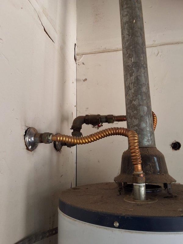 Performed inspection on Whirlpool water heater model NU40461-403 with pilot light failure. Unit determined to be subject to recall and replacement recommended due to age and safety concerns. Provided estimate for new GN40T1-3-6 water heater installation including necessary code modifications and permit requirements, with installation appointment scheduled.
