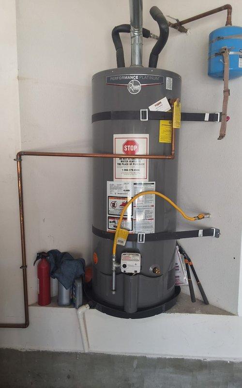 Responded to property management service call for water heater with no hot water and blinking red control light. Upon arrival, performed diagnostic evaluation on Rheem Performance Platinum model XG50T12HN38U1 (manufactured June 2018). Inspected unit installation, connections, gas supply line, copper piping, expansion tank, and all safety components. Documented equipment condition and findings with photographs. Contacted office from site with diagnostic results per property management protocol for pricing approval before proceeding with any repairs.