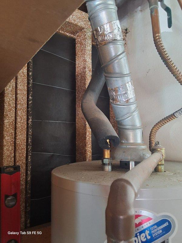 Replaced a 14-year-old 50-gallon Rheem gas water heater (Model MI5036FBN, Serial J1316303784) that had reached end of serviceable life. Installed new 50-gallon Guardian gas water heater with proper venting and plumbing connections. Connected copper supply lines, installed flexible gas connector, and secured metallic vent pipe to existing exhaust system. Tested all connections for leaks, verified proper combustion and venting operation, and confirmed hot water delivery to fixtures.
