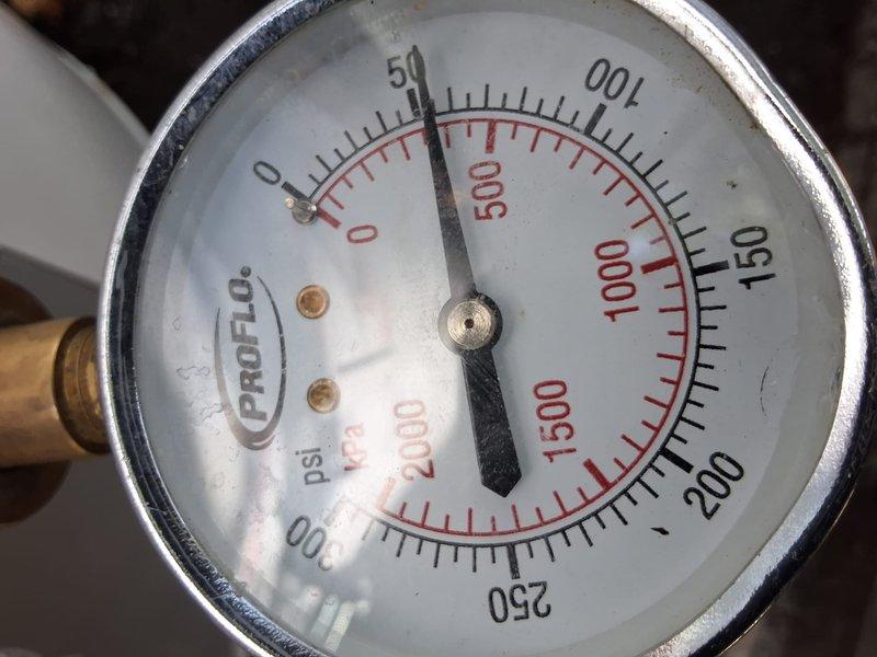Completed replacement of 30-gallon gas water heater at unit 3152 per property management authorization. Removed existing failed unit and installed new water heater, verified proper gas connections, tested temperature and pressure relief valve showing operational reading at approximately 55 PSI, and confirmed system functionality before departure.