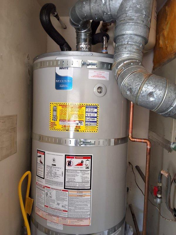 Responded to gas odor complaint on Bradford White 75-gallon propane water heater (Model RG275H6X, Serial AB52871455). Performed comprehensive leak inspection of gas supply lines, connections, and control valve assembly. Verified proper venting system installation and confirmed unit is operating safely with no detectable gas leaks present upon completion of inspection.