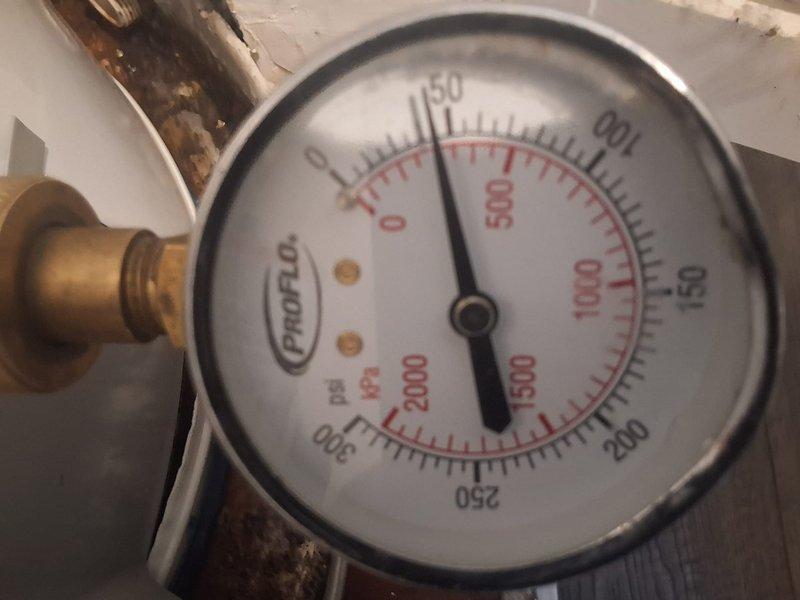 Performed warranty inspection on American Standard water heater model GN50T1-3-6, serial F23-025331, previously installed in October 2024. Verified system pressure readings on PROFLO gauge, inspected all plumbing connections including copper piping and circulator pump assembly, and confirmed proper operation of unit with no issues found requiring repair at this time.