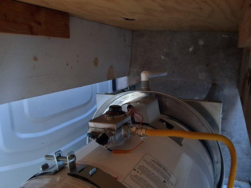 Responded to warranty callback for recently installed water heater model GN40T1-3-6 with no cold water available since installation. Inspected plumbing connections and gas control assembly, verified proper installation of inlet/outlet piping, and corrected crossover issue preventing cold water flow. Unit tested and confirmed delivering both hot and cold water properly upon completion.