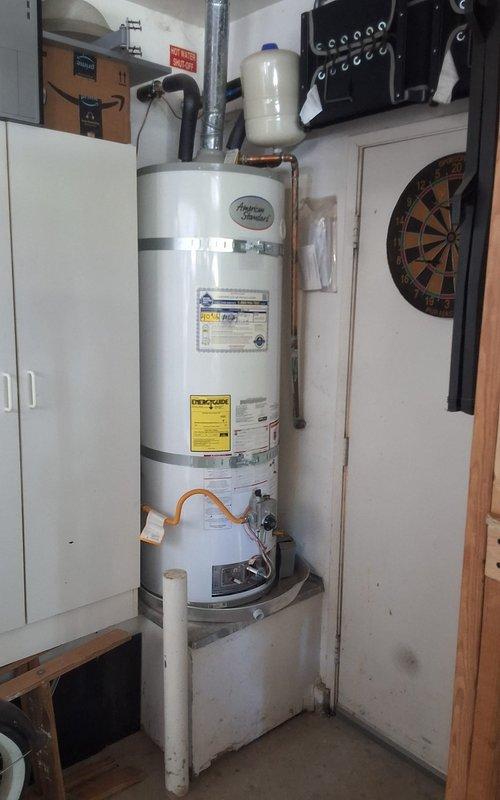 Completed warranty repair on Goodman water heater model GN50T1-3-6, serial number G24-021047. Performed no-heat-water diagnostic and repair under manufacturer parts warranty coverage. Unit restored to proper operation with all safety labels and connections verified intact.