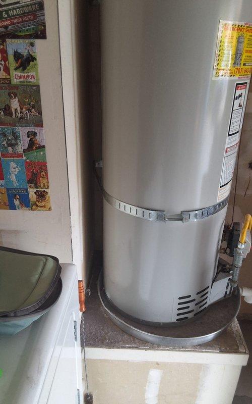 Responded to no hot water condition on 2011 50-gallon gas water heater that was originally installed by our company. Performed complete residential water heater replacement, installing new 50-gallon gas unit model GN50T1-3-612YR with seismic restraint strap, connected supply and discharge piping, installed proper venting system, and ensured all connections met code requirements. Customer was advised of permitting requirements and arrival window was confirmed prior to completion.