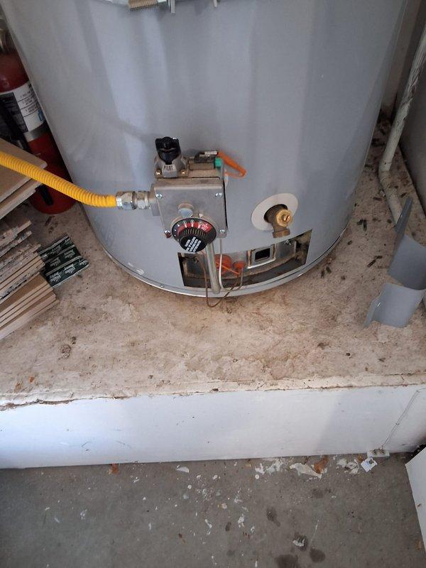 Responded to service call for 21-year-old State Select water heater (Model S650YOCTG) with non-functioning ignition switch. Performed comprehensive inspection of unit and surrounding installation area, documenting existing conditions including gas connections, temperature controls, gas control valve assembly, and discharge piping. Assessed current code compliance status and identified potential code modifications that would be required for replacement installation. Provided estimate for replacement with new 50-gallon atmospheric vent water heater (Model GN50T1-3-6), including options for extended warranty and permit acquisition. Discussed available payment methods and scheduled follow-up for installation pending customer approval.