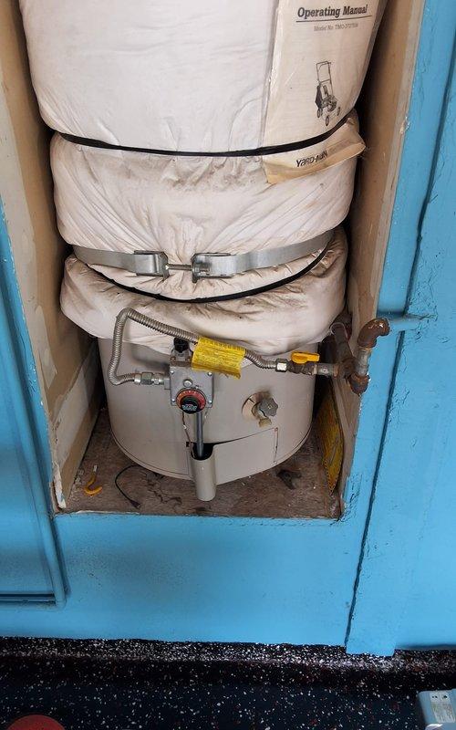 Replaced aging 40-gallon gas water heater from 1998 with new 40-gallon residential unit. Completed full installation including proper venting, gas line connections, pressure relief valve, and seismic strapping in compliance with code requirements. Customer was advised of permit requirements and provided with ballpark estimates for the replacement work.