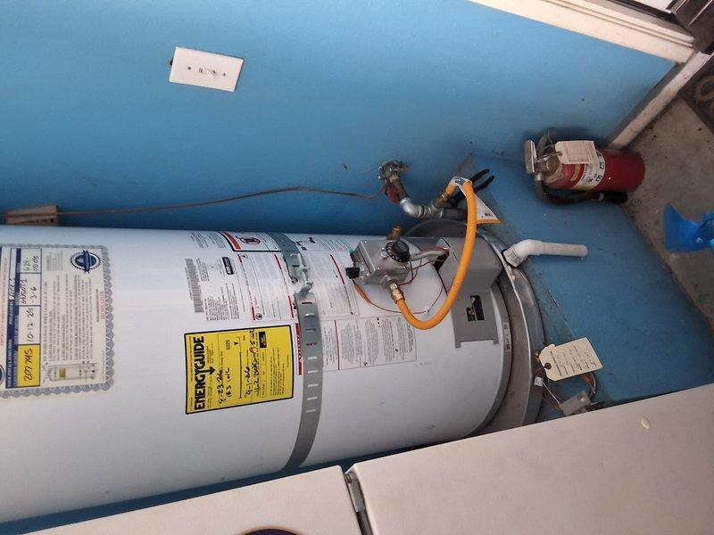 Responded to no hot water callback on American Standard gas water heater model GN50T1-3-6. Upon arrival, verified unit was operational with proper voltage supply. Subsequently returned for continued no hot water issue and replaced gas control valve and pilot assembly kit under 90-day labor warranty to restore proper heating function.