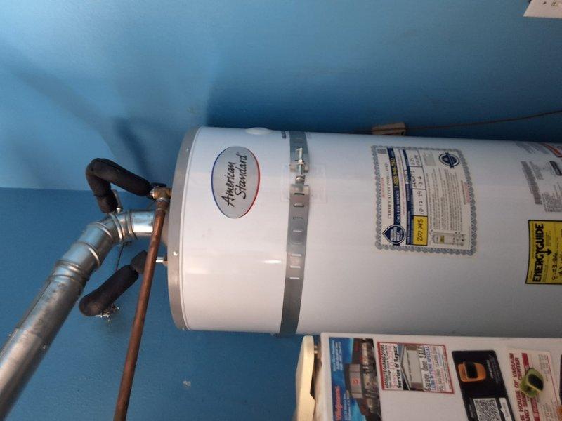 Responded to no hot water callback on American Standard gas water heater model GN50T1-3-6. Upon arrival, verified unit was operational with proper voltage supply. Subsequently returned for continued no hot water issue and replaced gas control valve and pilot assembly kit under 90-day labor warranty to restore proper heating function.