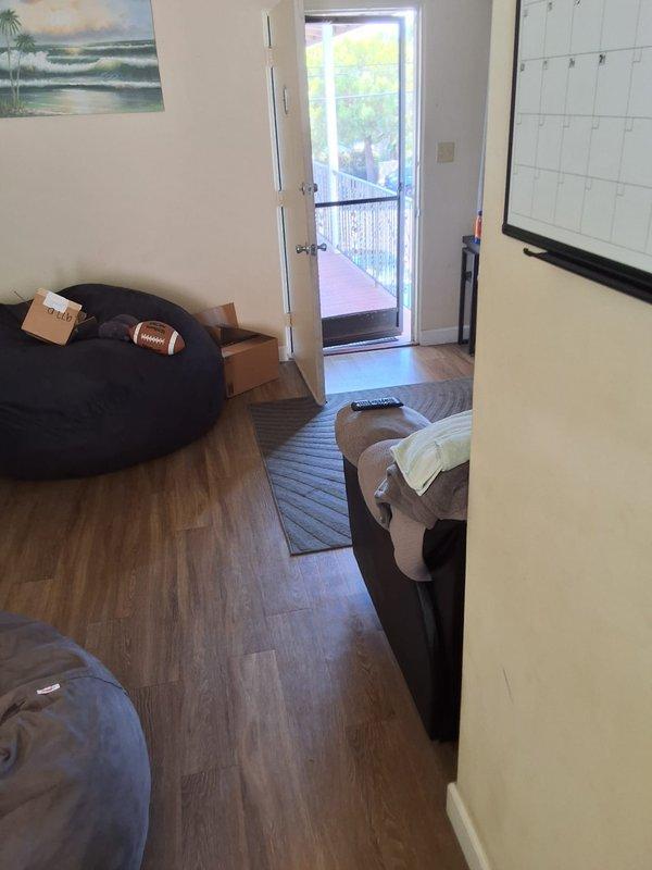 Responded to property management work order for gas water heater leaking at bottom. Conducted on-site evaluation of 40-50 gallon gas water heater unit and documented findings with photographs. Contacted office from site with assessment results per property management protocol for pricing determination.