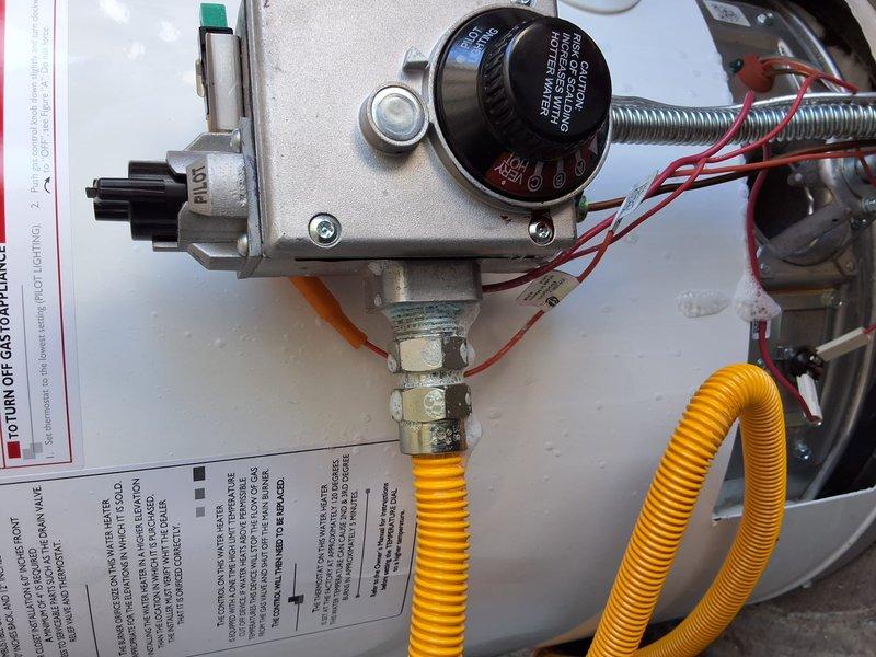 Responded to warranty service call for Goodman model GN50T1-3-6 water heater with pilot light ignition failure. Upon inspection, discovered damaged thermopile/thermocouple assembly preventing proper pilot flame signal to gas control valve. Replaced faulty thermopile with OEM warranty part, tested gas valve operation, verified proper pilot ignition and main burner flame establishment, and confirmed unit returned to normal operating parameters.