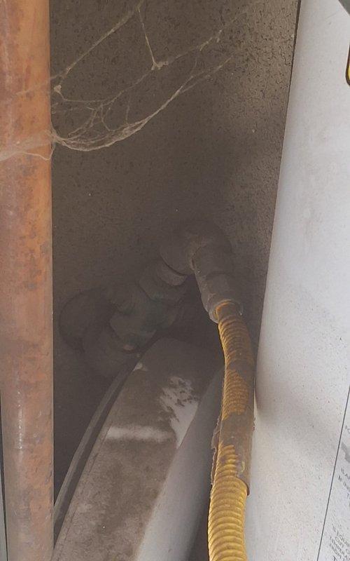 Responded to property management account for water heater troubleshooting at unit 3154. Upon arrival, accessed crawl space and inspected 30-gallon gas water heater installation. Identified failed water heater requiring full replacement due to inability to repair existing unit. Evaluated gas flex line connection and venting configuration in confined space. Documented conditions with photographs showing exterior unit access and crawl space installation area with existing gas flex connector and structural layout. Contacted office with findings and recommendations for replacement authorization per property management protocol.