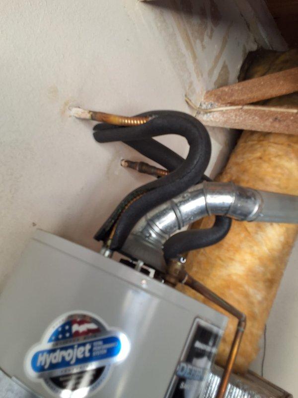 Performed inspection on 14-year-old Bradford White 40-gallon gas water heater (Model MI40T6FRN, Serial JC16454688) reported to have a gas leak. Conducted thorough safety assessment of unit, gas connections, and exhaust venting system. Documented existing HVAC equipment configuration including furnace and water heater installation with photographs showing gas line connections, exhaust piping, and overall mechanical room setup. Provided free estimate for replacement options and advised on permit requirements for potential water heater replacement.