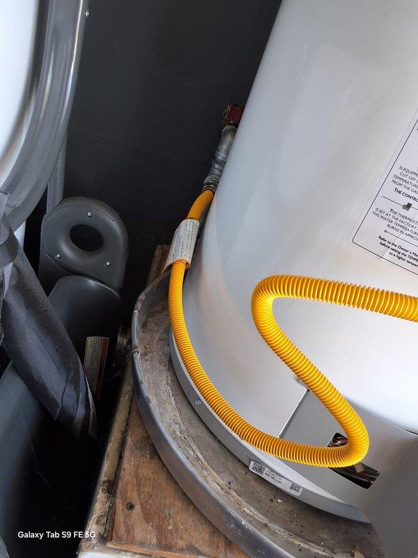 Responded to follow-up no heat warranty call on Goodman furnace model GN50T136NAT. Upon arrival, inspected unit and associated components including gas line connections, venting system, and blower assembly. Verified proper installation of yellow flexible gas line, checked all fittings and connections for secure attachment, and confirmed water heater and HVAC equipment were operating within normal parameters. System restored to full operational status under first-year warranty coverage.