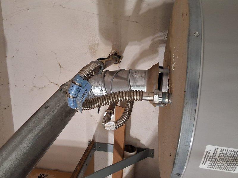 Responded to service call for leaking 75-gallon residential water heater requiring complete replacement. Removed and disposed of failed unit, then installed new 75-gallon water heater with proper venting and code-compliant connections. Connected gas supply line using flexible corrugated connector, installed new copper water supply lines with shutoff valves, and secured unit to structural supports per manufacturer specifications. Verified all connections for leaks, tested temperature and pressure relief valve operation, and confirmed proper combustion and venting. Advised property owner of permitting requirements for water heater replacement work.