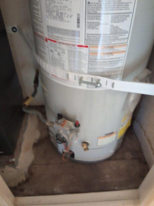 Conducted inspection and provided estimate for preventative replacement of aging 40-gallon gas water heater in garage. Evaluated existing Bradford White unit with corrugated flex connectors and verified clearance measurements above tank. Discussed permit requirements and presented replacement options including 40-gallon gas water heater with necessary code upgrades and modifications.