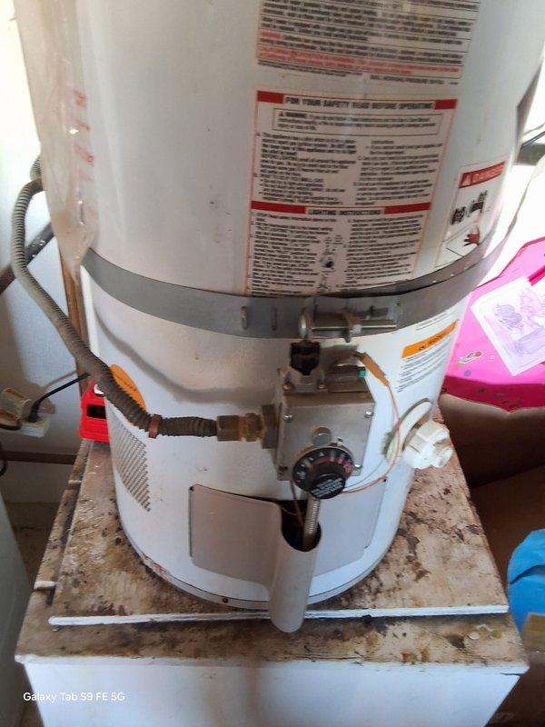 Responded to service call for leaking 40-gallon gas water heater. Upon inspection, confirmed active leak from existing unit with no available age or model information. Removed and properly disposed of failed water heater. Installed new 40-gallon gas water heater with appropriate gas connections using flexible copper gas lines and control valve assembly. Secured unit with metal safety strapping per code requirements. Connected water supply lines, installed temperature and pressure relief valve with discharge piping, and verified proper venting configuration. Tested all gas connections for leaks, confirmed proper ignition and burner operation, and verified adequate hot water delivery. Discussed permit requirements with property owner and provided information regarding available payment options.