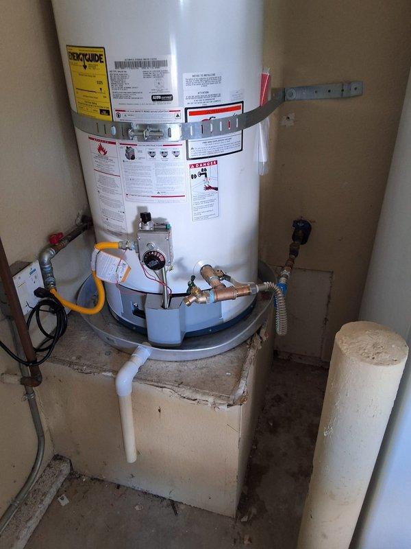 Responded to warranty service call for GN50T1-3-6 natural gas water heater (S/N: M25-063862) with customer complaint of loss of instant hot water delivery and non-functioning circulation pump. Inspected circulation pump system mounted on top of unit, tested pump operation and verified proper electrical supply and plumbing connections. Restored instant hot water functionality under first-year manufacturer warranty coverage.