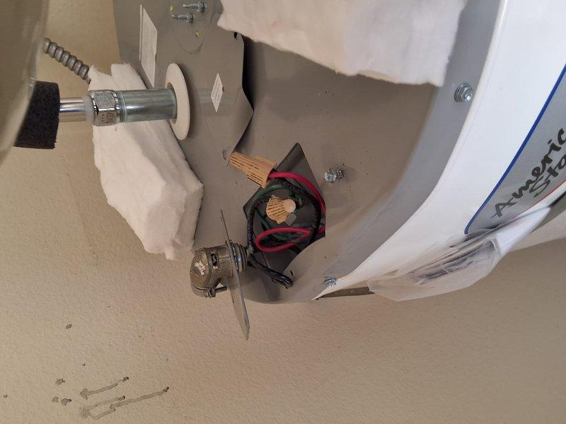 Responded to no hot water complaint on Enstrom ENS50H-6 water heater (S/N F25-033797) under first-year warranty. Inspected unit and verified all plumbing connections, expansion tank, and electrical components were functioning properly. Documented installation with photos and confirmed system operational per manufacturer specifications.