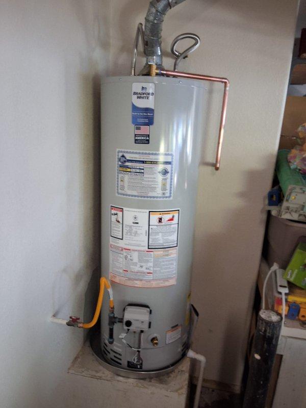 Responded to service call for leaking water heater and successfully completed full replacement of 50-gallon gas water heater that was over 10 years old with no model or serial number available. Installed new 50-gallon gas water heater with proper venting, reconnected copper water supply lines, and attached flexible gas line to unit. All connections were tested for proper operation and safety compliance upon completion.
