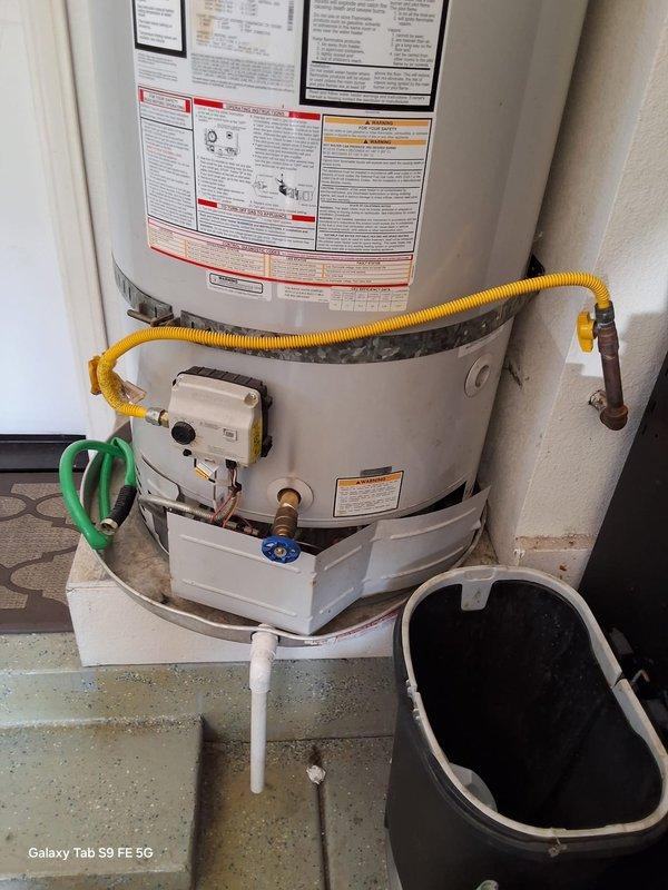 Responded to service call regarding 75-gallon Bradford White gas water heater (Model URG275H6N, Serial SG41793773) originally installed in 2018 under Fidelity warranty #FN6831960. Customer requested installation of third earthquake strap to bring unit into compliance with local seismic requirements for home sale. Upon arrival, inspected existing water heater installation and confirmed unit currently secured with two earthquake straps. Verified water heater model information and installation details. Documented current installation configuration with photographs showing Bradford White Ecomatic IV Series unit with standard gas connections, venting, and plumbing. Matter requires office review for warranty coverage determination and approval prior to completing additional earthquake strap installation.