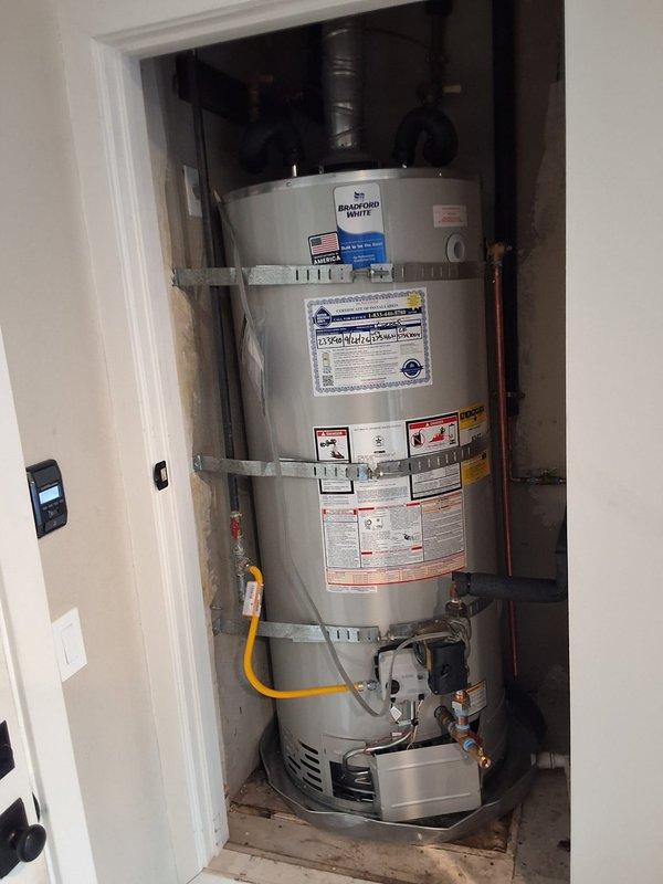 Responded to a repeat customer for a leaking 75-gallon gas water heater (Bradford White model URG275H6N) that was originally installed eight years prior. Removed and replaced the failed unit with a new 75-gallon gas water heater, reconnected gas supply line and water piping, installed proper venting, and tested system for proper operation and safety compliance.