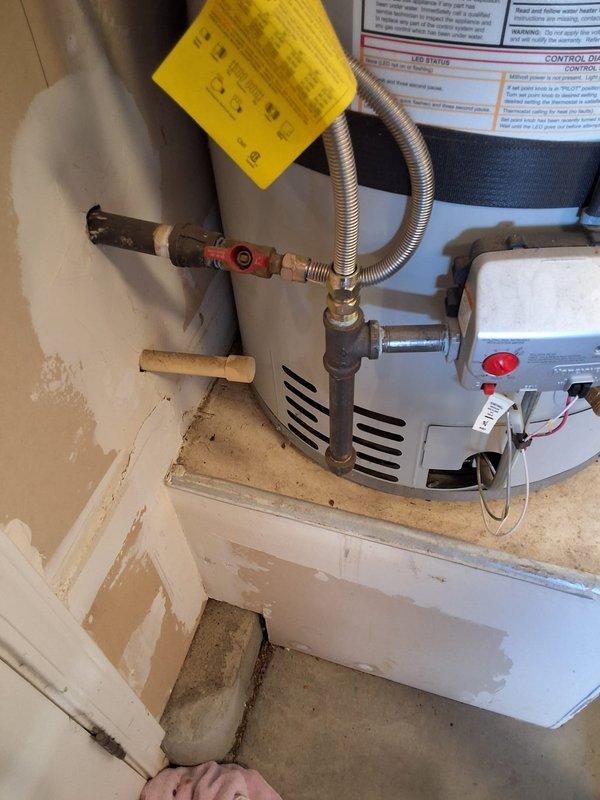 Performed inspection and estimate on an approximately 11-year-old Bradford White 50-gallon gas water heater. Unit evaluated for preventive replacement as requested. Assessed existing installation including gas line connections with flexible connector, copper supply piping with shutoff valves, pressure relief valve discharge piping, and recirculation pump system. Documented current equipment condition and configuration through photographs. Discussed replacement options with customer, who specifically requested another Bradford White unit. Noted permit requirements need to be addressed prior to replacement work. Follow-up appointment scheduled for future installation.