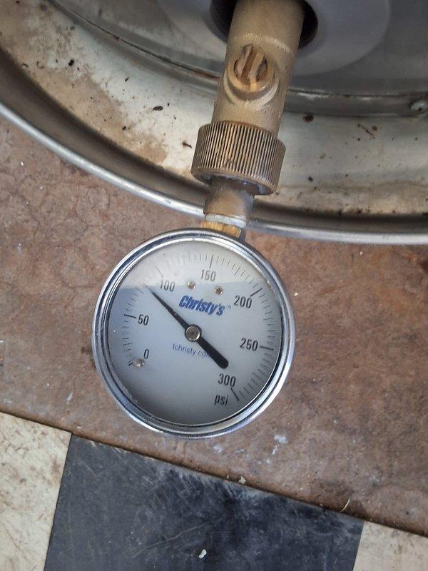 Responded to service call for water heater leaking from top connections. Upon arrival, inspected 50-gallon electric water heater model PROE50T2, serial number M481912477, originally installed in 2020. Diagnosed active leak originating from upper plumbing connections. Tested pressure relief valve and expansion tank functionality. Verified unit is operating beyond warranty coverage period. Presented customer with repair options including replacement of failed components and parts, as well as full unit replacement option with 50-gallon electric model RG150T6N. Documented existing installation with photographs showing water heater configuration, copper supply lines, expansion tank mounting, and pressure gauge readings. Customer to advise on preferred course of action for leak resolution.