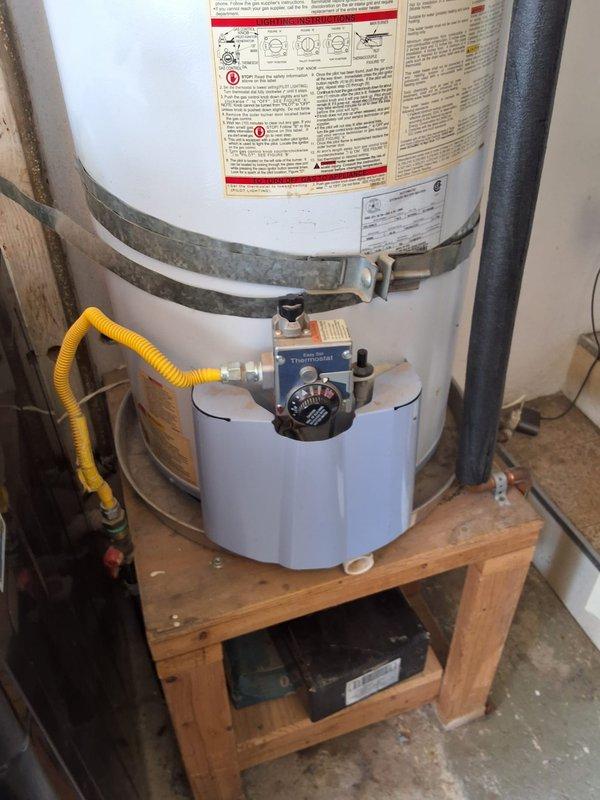 Completed preventative replacement of existing AO Smith 50-gallon gas water heater with new American Standard 50-gallon gas unit. Installed unit on wooden platform with proper seismic strapping, connected flexible gas line and copper water supply lines with expansion loops, and ensured all connections meet code requirements. City permit obtained for installation per local regulations.