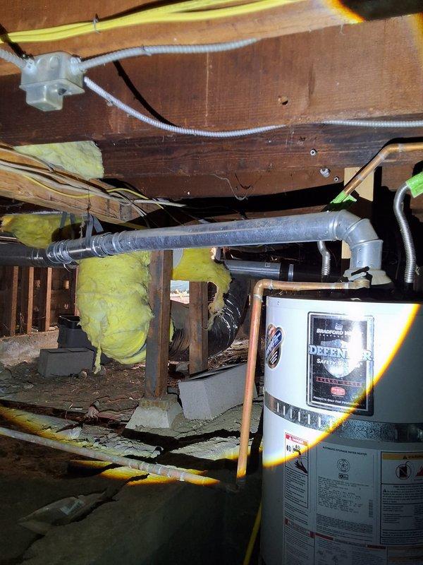 Completed inspection and estimate for preventative heat pump conversion at property with existing 50-gallon gas water heater currently located in crawlspace/cellar area. Assessed current Bradford White gas water heater installation, noting challenging access conditions in crawlspace with exposed floor joists, aging insulation, and limited clearances. Evaluated structural considerations including wooden support beams, existing utility connections, and confined workspace that will impact installation complexity. Proposed American Standard 50-gallon gas water heater as replacement option. Documented existing gas line connections, venting configuration, and electrical requirements. Discussed Berkeley City permit requirements with customer and confirmed understanding that difficult crawlspace access will affect project scope and timeline.