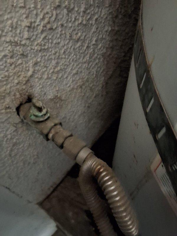 Responded to service call for leaking 50-gallon gas water heater located in garage. Removed and properly disposed of failed unit. Installed new GN50T1-3-6 gas water heater as replacement, ensuring all connections met current code requirements. Completed necessary modifications to bring installation into compliance with local building standards. Secured required permit for installation. Verified proper operation of new unit including gas connections, venting system, temperature and pressure relief valve, and all water supply lines. System tested and confirmed leak-free with no operational issues.