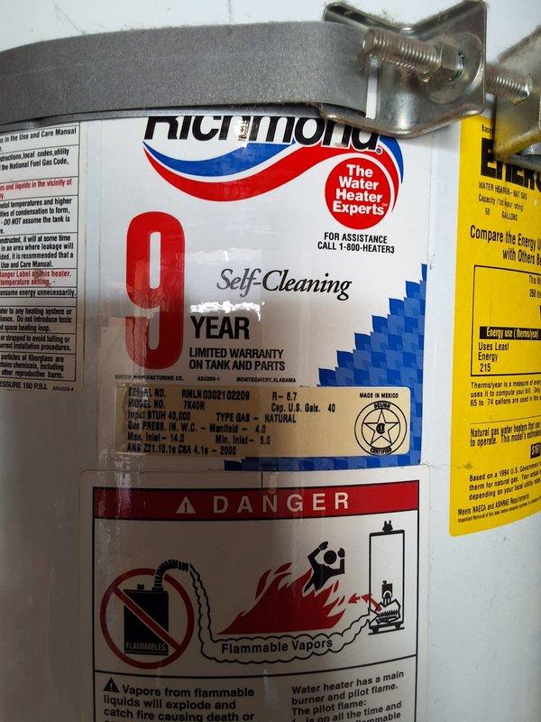 Replaced existing 40-gallon gas water heater in garage with new Richmond 40-gallon gas unit featuring self-cleaning technology and 9-year limited warranty on tank and parts. Installed unit on elevated metal stand per code requirements, connected flexible gas line to gas control valve assembly, and completed all water pipe connections. Verified proper operation of all safety controls and ensured compliance with applicable building codes and permitting requirements.