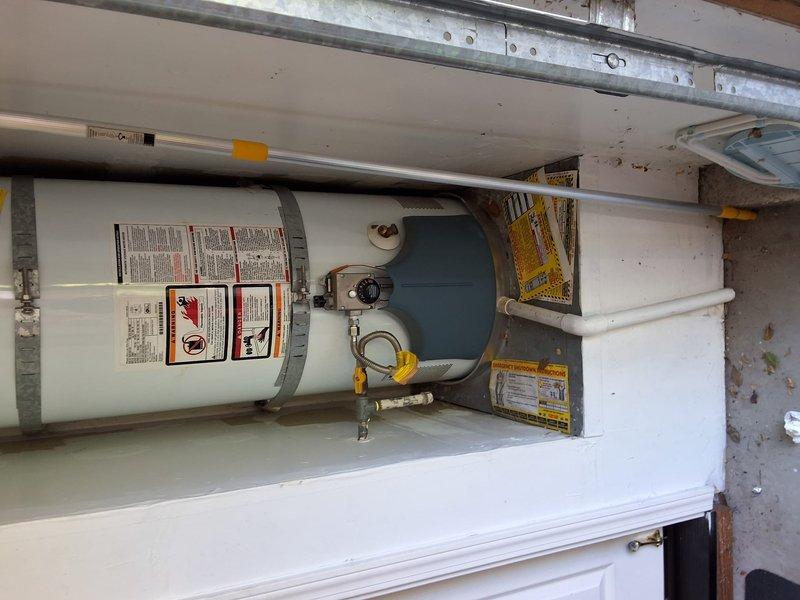 Responded to property management service call for no hot water complaint. Conducted on-site evaluation of residential water heater installation located in utility closet. Inspected unit, plumbing connections, valves, and associated components. Documented existing conditions with photographs and contacted office with diagnostic findings for pricing approval per property management protocol.
