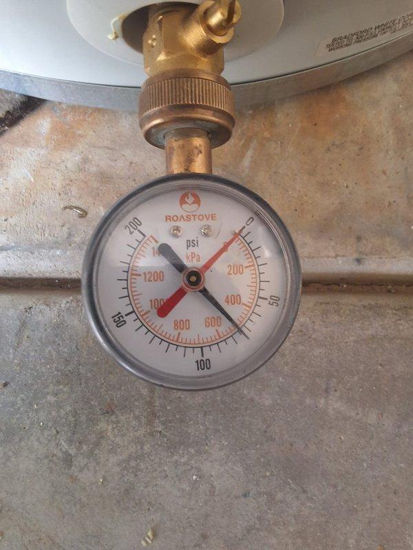Responded to service call for leaking water heater at residential property. Removed and disposed of failed Rheem ProE50 electric water heater (50 gallon, Model #PROE50, Serial #M231504470) that had reached end of service life after eight years of operation. Installed new Bradford White 50-gallon electric water heater as replacement unit. Connected all water supply lines, electrical connections, and safety components per manufacturer specifications and local code requirements. Installed temperature and pressure relief valve with proper discharge piping. Verified system pressure using calibrated gauge, confirming readings within acceptable operating parameters. Tested electrical voltage and continuity at heating elements using multimeter to ensure proper power supply and component function. Filled tank, purged air from lines, and conducted full operational test of new unit. Verified no leaks at all connection points and confirmed water heater achieved proper operating temperature. System