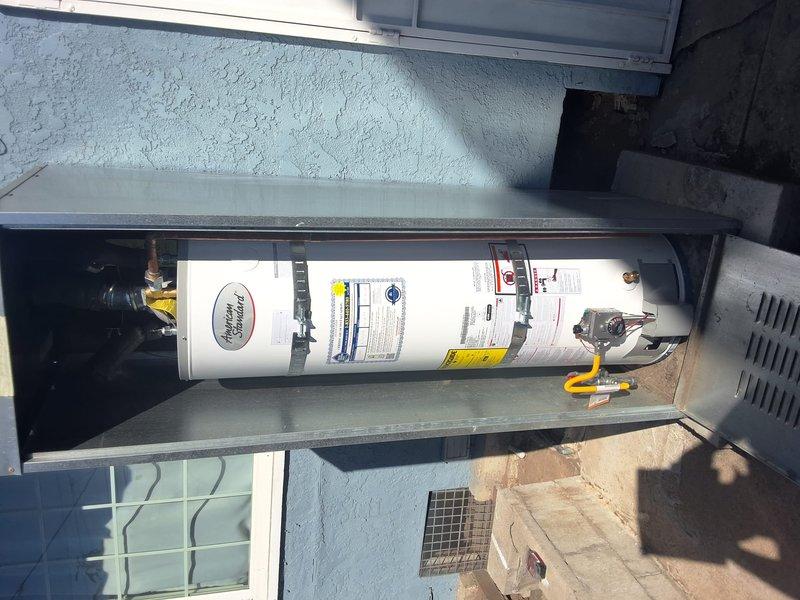Responded to no hot water complaint on water heater model GN40T1-3-6 installed two weeks prior. Inspected unit, verified proper gas line connection, plumbing connections, and ventilation within exterior enclosure. Diagnosed and resolved issue under first-year labor warranty, restoring hot water functionality to the system.