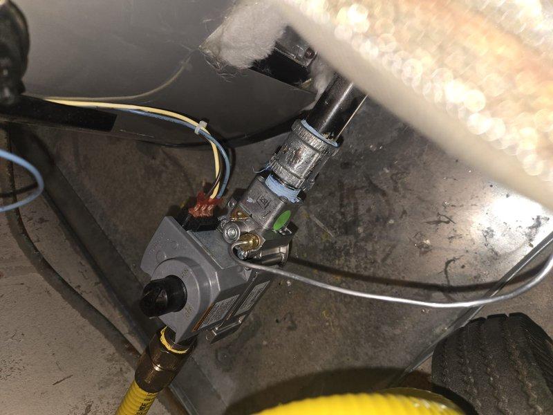 Responded to warranty call for HVAC system diagnostics to restore unit operation. Upon inspection, examined gas valve assembly, electrical connections, and associated components within the furnace cabinet. Verified proper wiring connections including ground wire, checked gas valve operation, and inspected refrigerant line insulation and mounting hardware. Diagnosed system issues preventing unit from coming online and completed necessary adjustments to restore equipment to proper working condition.