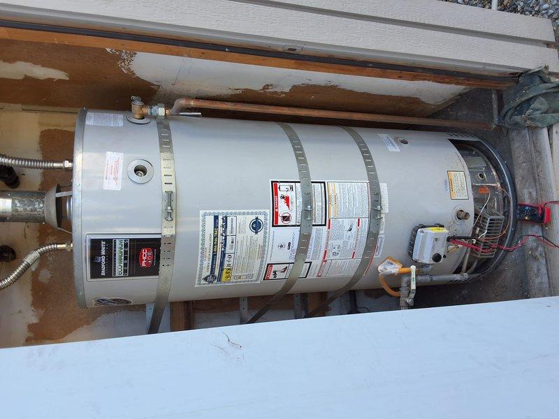 Responded to no hot water call on property management account. Upon arrival, performed diagnostic evaluation on 75-gallon gas water heater (Model URG275H6N, Serial WH46333187) that was previously installed by our organization. Conducted electrical testing using multimeter on control components and verified gas supply and ignition system. Unit would not relight as reported. Documented equipment condition and diagnostic findings with photos. Contacted office from site with evaluation results per property management protocol for pricing approval before proceeding with repairs.