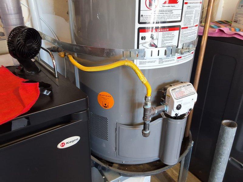 Performed inspection and estimate for replacement of existing Rheem 50-gallon gas water heater (Model CG50T12HNB8UI, Serial M301701122) with Navien tankless water heater system. Evaluated current installation conditions including gas line configuration, venting requirements, and utility room space constraints. Discussed permit requirements for Mira Mesa jurisdiction and provided customer with equipment options and installation scope.