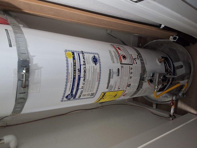 # Warranty Service - No Hot Water Condition

Responded to warranty call for Goodman water heater model GN30T1, serial D26-019199, reporting no hot water. Upon arrival, performed diagnostic testing using digital multimeter to check electrical components and heating element continuity. Multimeter readings indicated 0.22 ohms resistance on heating element, confirming element failure as cause of no hot water condition. Inspected unit installation, plumbing connections, and overall system operation. Replaced defective heating element under first-year manufacturer warranty. Verified proper electrical connections to new element, tested thermostat operation, and confirmed water heater restored to full functionality with adequate hot water production. Unit now operating within normal parameters. All work completed under warranty coverage with no charge to customer.