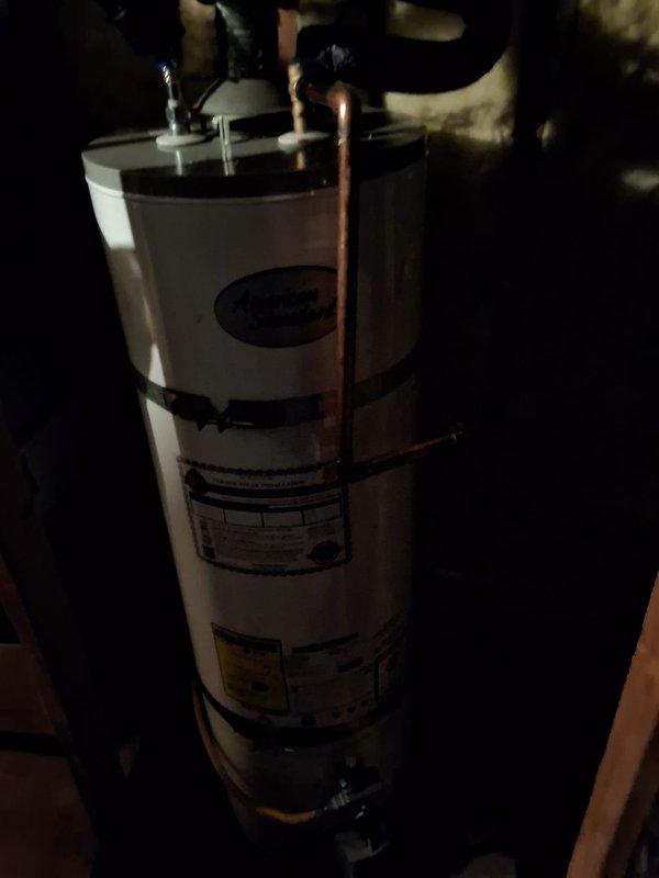 Responded to a no-hot-water complaint on a gas-fired storage water heater (model GN40T1-3-6) within the first year of service under warranty. Inspected the unit and its gas control assembly, copper supply and outlet piping, and tank strapping, and performed the necessary warranty repair to restore hot water operation. Verified proper operation after repair, with no leaks, corrosion, or other abnormalities observed.
