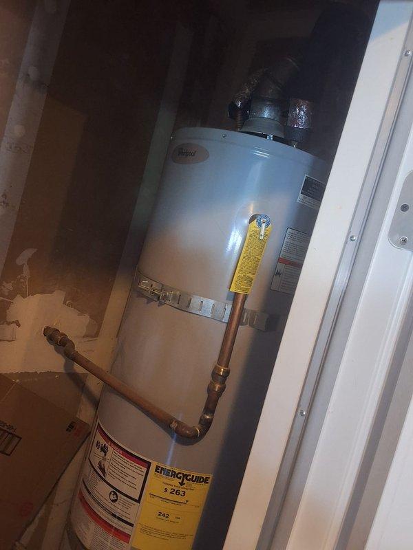 Replaced a recalled 40-gallon gas tank-style water heater that was producing popping and booming noises, which indicated sediment buildup and overheating. The existing unit was drained, disconnected from the gas, water, and venting connections, and removed from the closet. A new 40-gallon gas water heater was installed and connected to the gas supply, water lines, and flue, then tested for leaks, proper combustion, and safe operation.