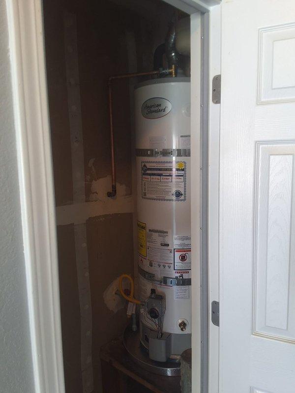 Replaced a recalled 40-gallon gas tank-style water heater that was producing popping and booming noises, which indicated sediment buildup and overheating. The existing unit was drained, disconnected from the gas, water, and venting connections, and removed from the closet. A new 40-gallon gas water heater was installed and connected to the gas supply, water lines, and flue, then tested for leaks, proper combustion, and safe operation.