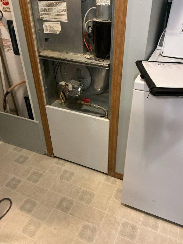 Conducted comprehensive assessment of 30-year-old propane furnace in manufactured home. Inspected internal components including motor, wiring, and ventilation system. Documented existing HVAC configuration and electrical capacity to evaluate feasibility of replacing with cold-climate ducted heat pump system versus new furnace installation, including potential rebate eligibility.